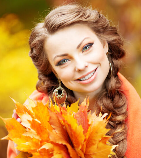 Ragazza truccata secondo le tendenze del make up per l'autunno 2024