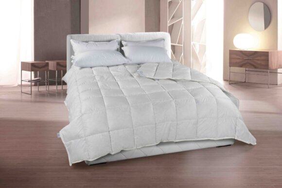 Cinelli-Piume-e-Piumini_Elba-1-580x387 Piumini e biancheria: il calore perfetto per Natale e tutto l’anno